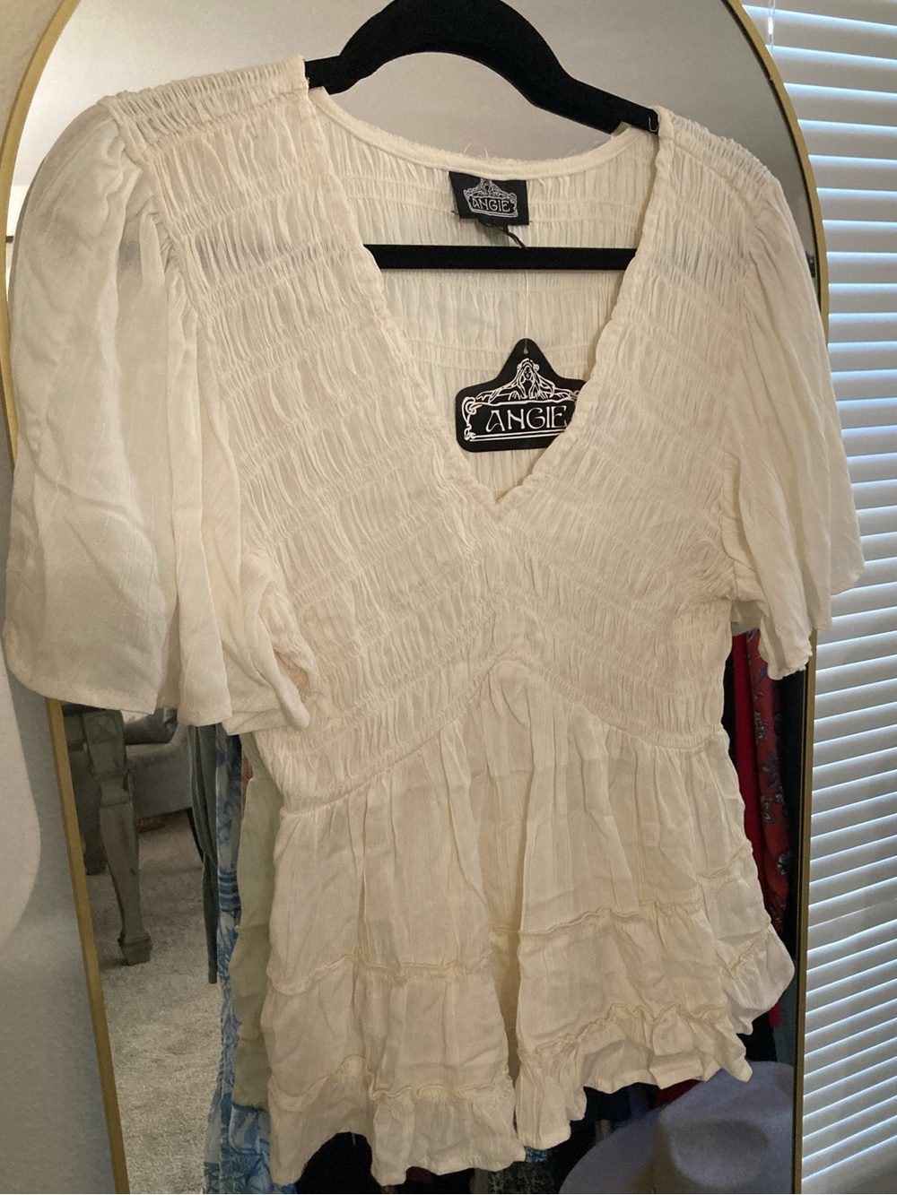 Angie Cream Smocked V-Neck Peplum Top
